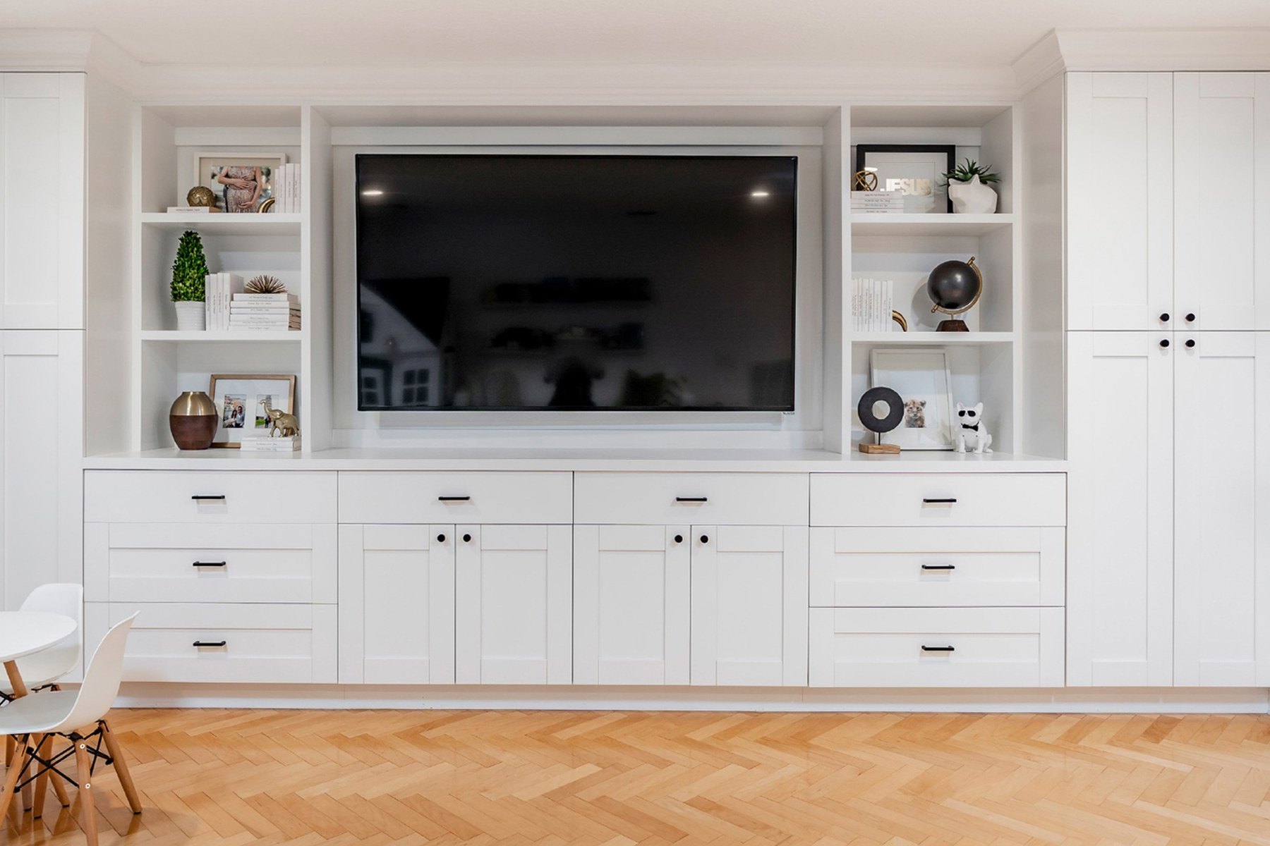 Built-in cabinet wall with storage and display shelves